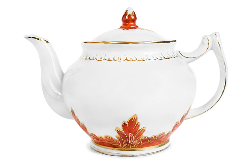 Vintage porcelain tea pot isolated on white background