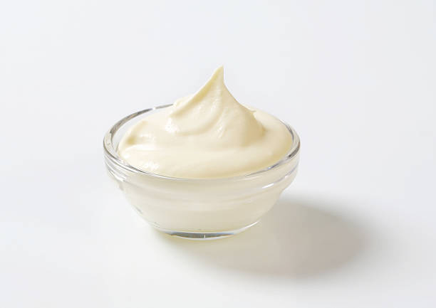 Cream cheese in a glass bowl Cream cheese in a glass bowl mayonnaise photos stock pictures, royalty-free photos & images