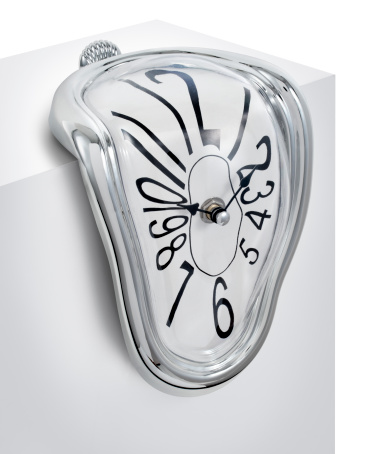 Clock dripping or melting to portray the concept of \
