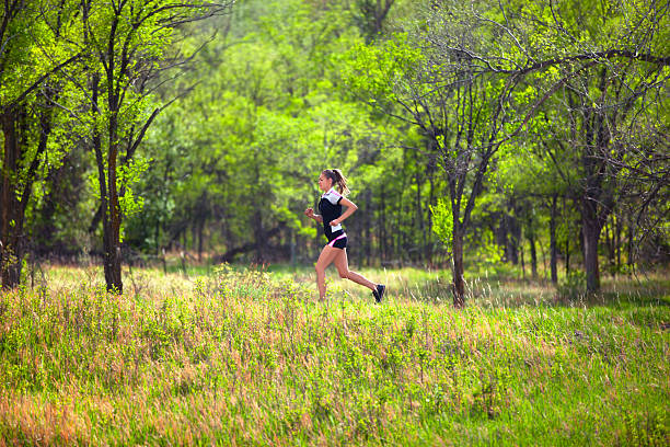 13,600+ Female Runner Woods Stock Photos, Pictures & Royalty-Free ...