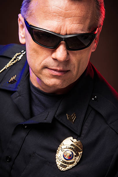 istock Determined Police Officer Portrait 170006153