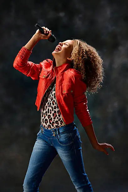 Photo of Young woman singing