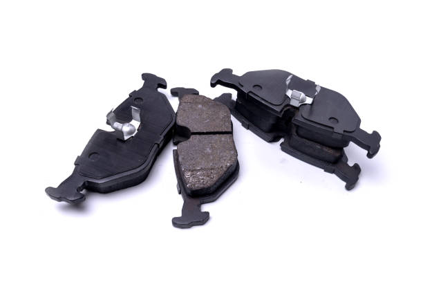 istock Car brake pads isolated on white 1700064143