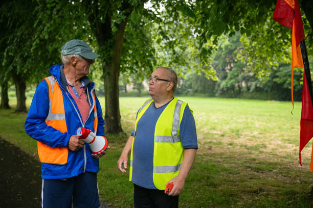 istock Volunteers Standing Together at the Fun Run 1700064179