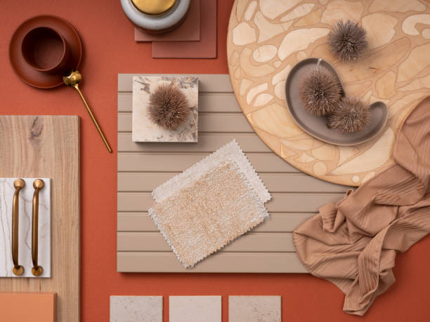 istock Stylish flat lay composition in orange and beige color palette with textile and paint samples, lamella panels and tiles. Architect and interior designer moodboard. Top view. Copy space. 1700070182