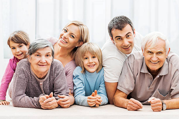 istock Extended family lying on the carpet 170007123