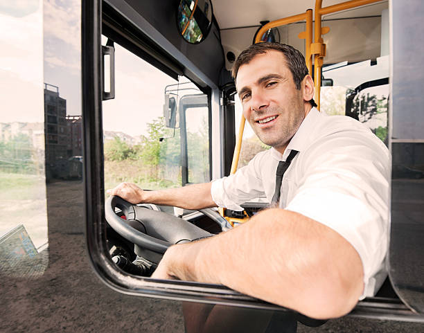 conducteur de bus. - driving a car photos et images de collection