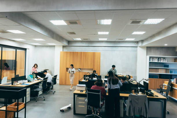 business office with desk and chairs in natural setting.