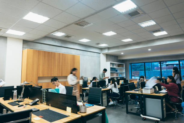 istock A bustling office where employees are working diligently and focused. 1700112069