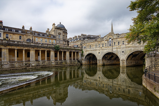 Pulteney Bridge and the weir on the river Avon in Bath Somerset England UK
