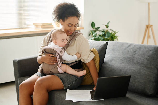 istock Woman working online during maternity leave 1700118274