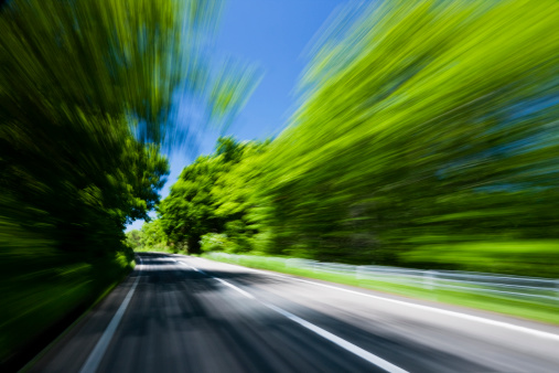 forest road drive with blur motion