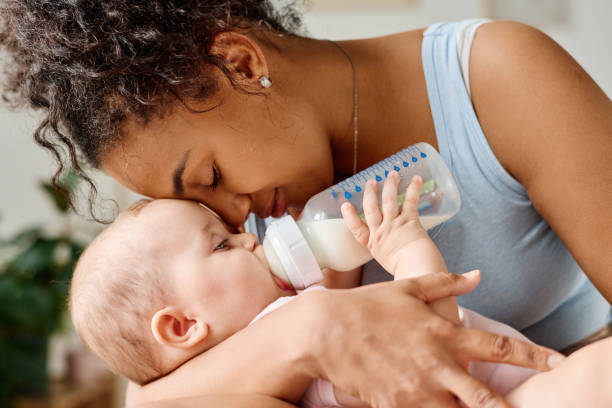 istock Mother enjoying hte time with her baby 1700119954