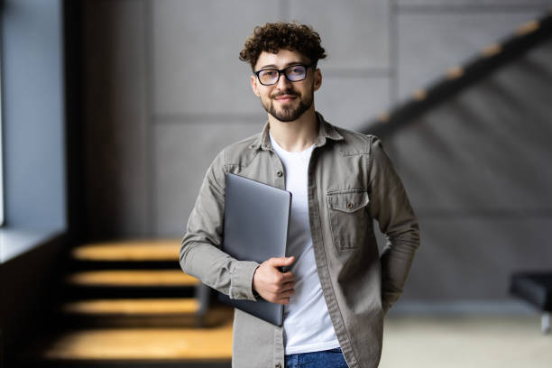 istock Happy manager ready for work from home on his laptop. 1700181893