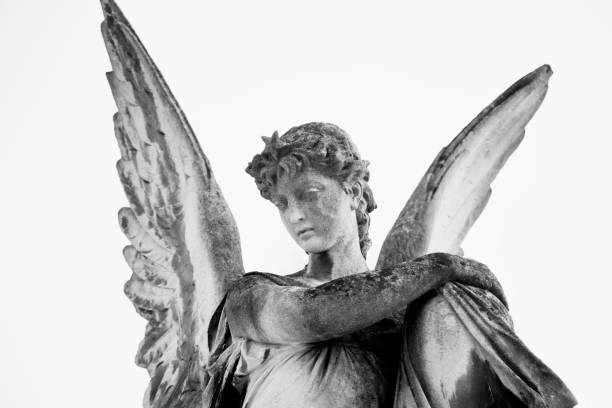 istock Vintage image of a sad angel. Retro stylized. (faith, religion, Christianity, death, immortality concept) 1700192151