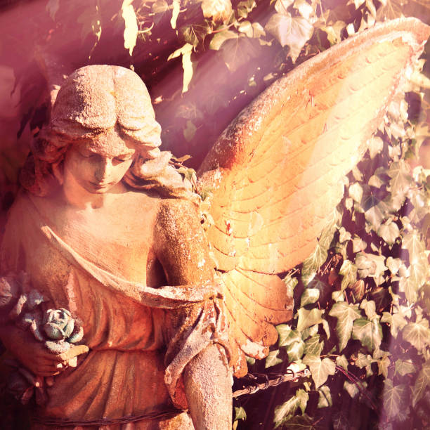 istock golden angel in the sunlight (antique statue) 1700192201