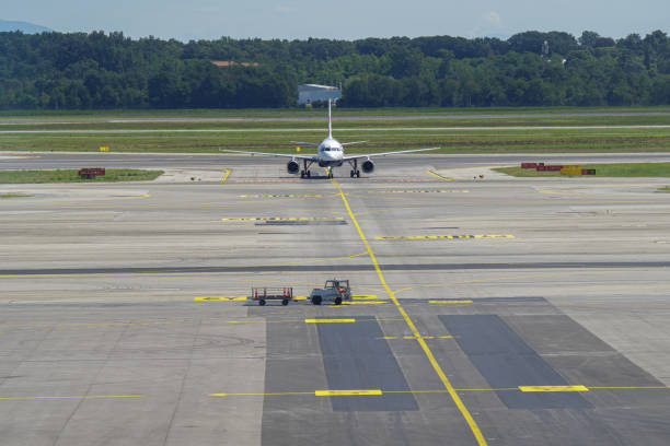 Front View of an Airplane in Motion on the Runway.