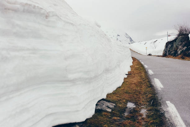 istock snowy road with ice 1700229654