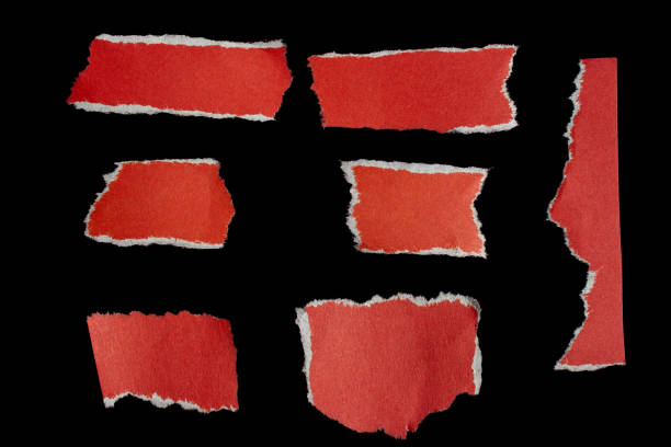 istock Ripped paper piece on isolated black background 1700240889