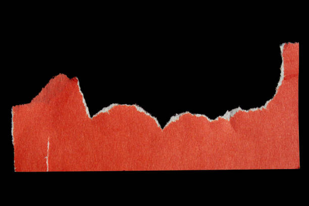 istock Ripped paper piece on isolated black background 1700243079