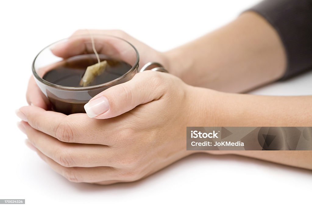 Copo de chá em suas mãos - Foto de stock de Beber royalty-free