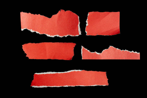 istock Ripped paper piece on isolated black background 1700244155