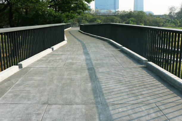 Concrete flooring of exterior elevated walkway.