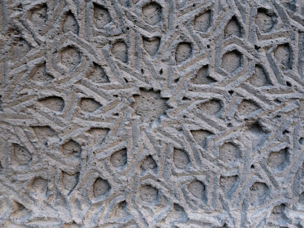 istock stone carving pattern from the wall of the historical stone mosque 1700246820