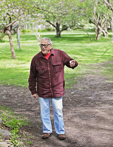 istock Senior Man Pointing Finger at Nature Park 170025186