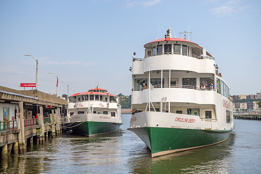 Pier 82, Manhattan, New York, USA - August 12th 2023:  Two boats from the famous and popular Circe Line in the harbor