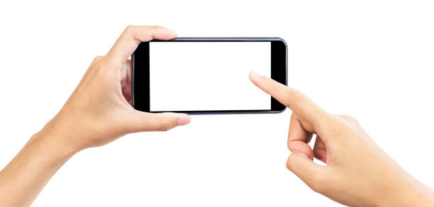istock Hand holding black smartphone isolated on white background, clipping path 1700255453