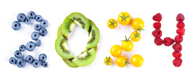 Mixed fruits. New year 2024 made of fruits on the white background. Healthy food