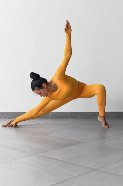 istock Side Lunge pose variation or Skandasana 1700271644