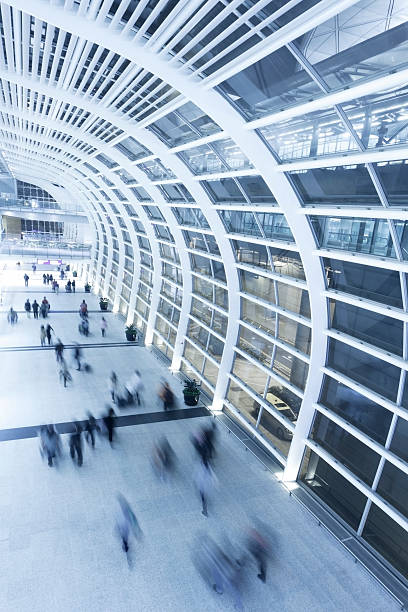 istock Airport walkway with travelers moving quickly 170027522