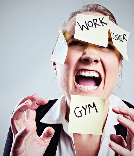 istock Multitasking gone mad! Overburdened woman covered in sticky  reminders 170027615