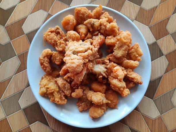 istock Crispy Fried Oyster Mushrooms On A Plate (Jamur Crispy) 1700278908