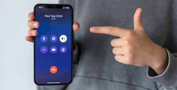 istock Incoming call screen from New Year 2024, close up. 1700281655