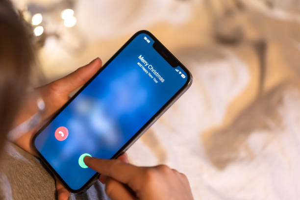 istock Incoming call screen from Merry Christmas, close up. 1700283355