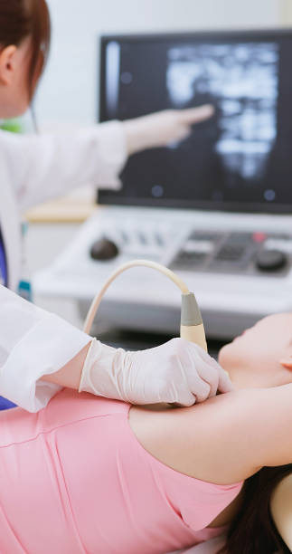 istock woman lymph ultrasound examination 1700285560
