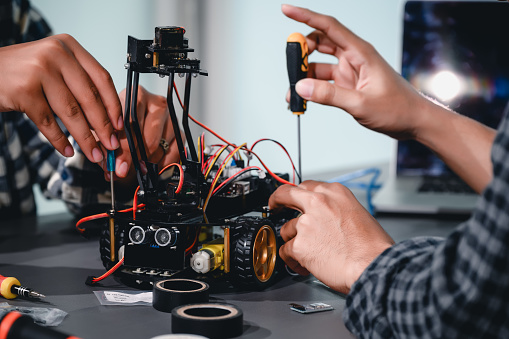 Robotics Combines Computer Science Engineer Asian Students Assembling Robotics Kits Learning Mechanical ...