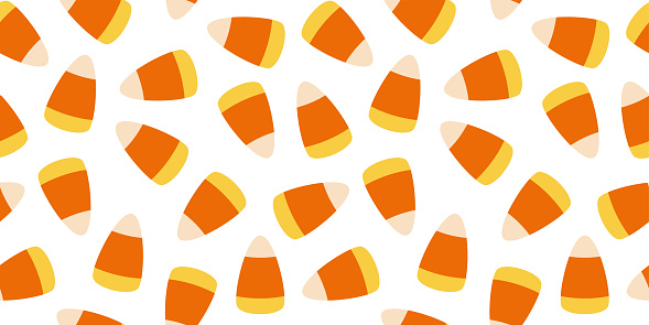 Halloween Candy Corn Seamless Pattern on White Background. Design for Halloween.