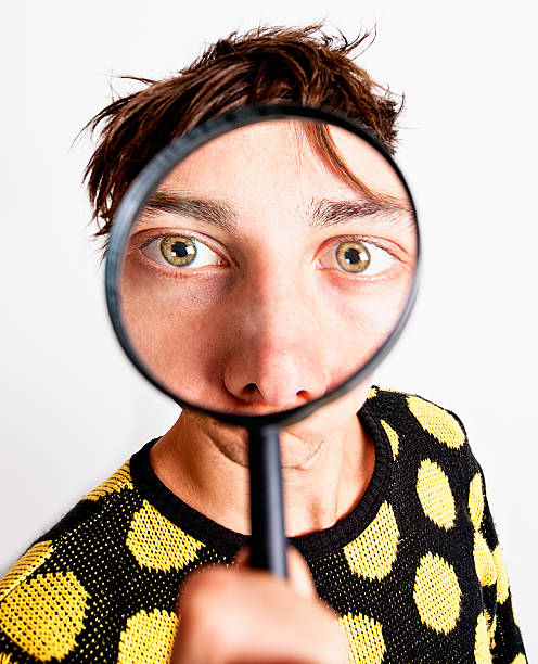 istock Magnifying glass makes man's eyes enormous! 170031474