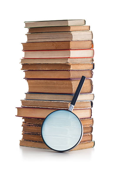 istock Old books and Magnifying glass 170031755