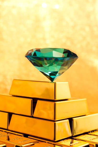istock Emerald diamond on top of golden pyramid 170031789