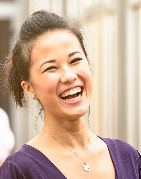 istock young pretty chinese girl smiling 170032386
