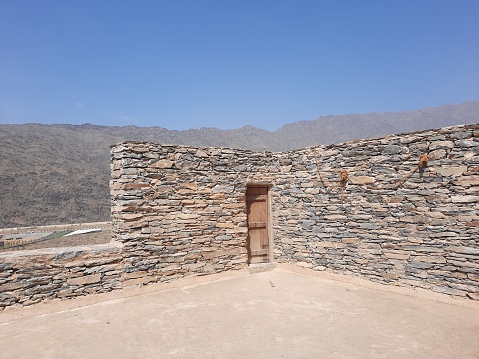 Beautiful daytime view of the historical ruins of Thee Ain (Zee Ain or Dhee Ain) Ancient Village in Al Bahah, Saudi Arabia. This place is also known as the historical Marble Village.