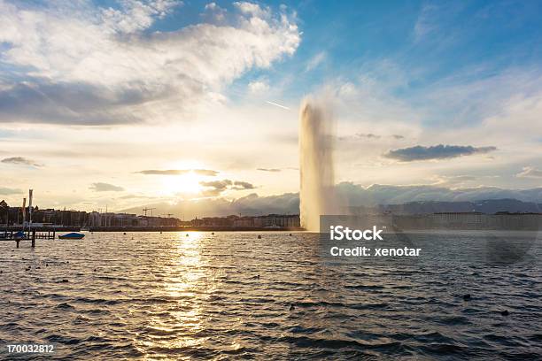 Lake Geneva Jet Deau And Sunset Of Alps Stock Photo - Download Image Now - Geneva - Switzerland, Jet D'eau, City