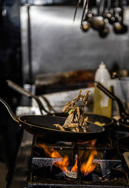 istock Grilled mushrooms in a pan. 1700334796