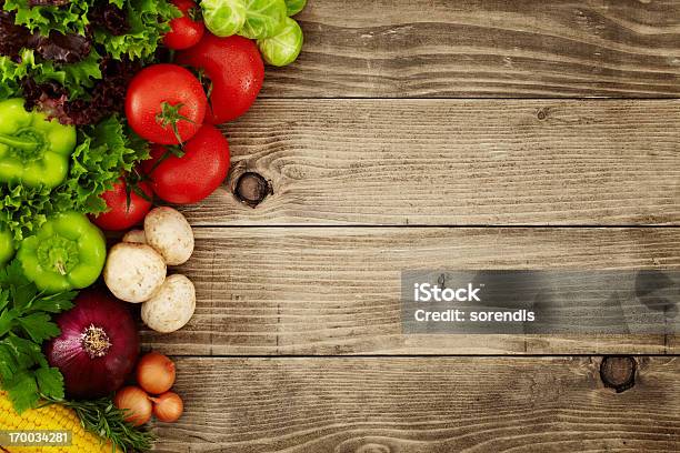 Healthy Organic Vegetables On A Wooden Background Stock Photo - Download Image Now - Vegetable, Backgrounds, Table