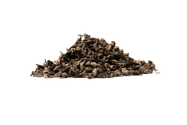 istock Dried tea leaves isolated on a white background. 1700345913
